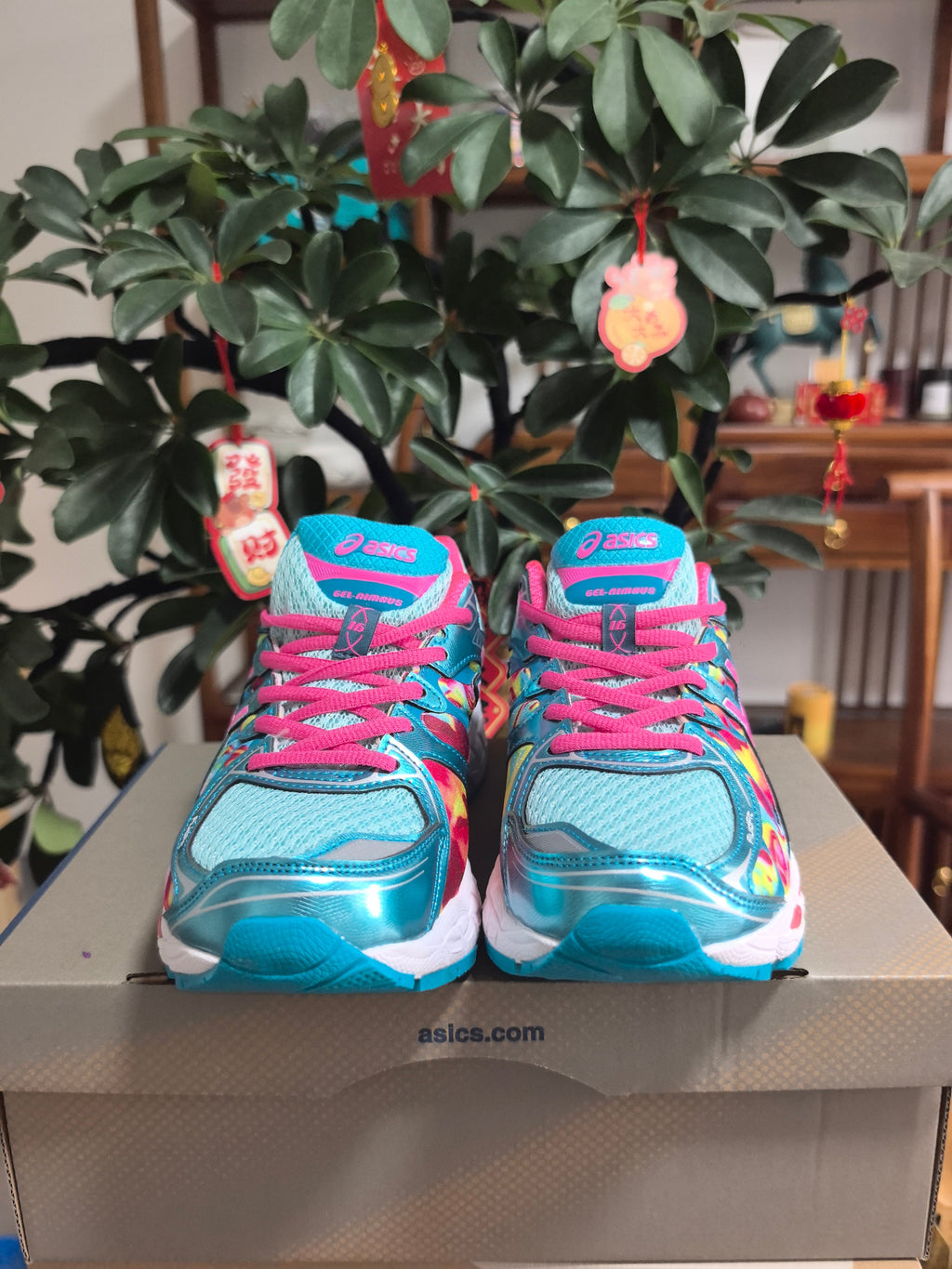 ASICS GEL-Nimbus 16 Sneakers in Pink, in Green and Blue - product image from the listing.