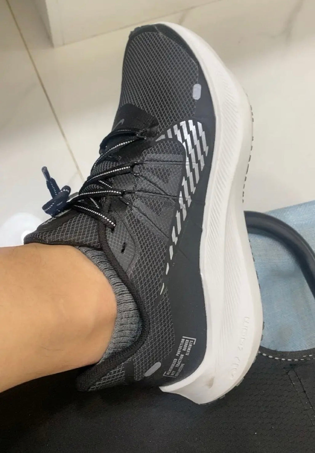 Nike Air Zoom Winflo 7 Shield Running Shoes in Black Silver CU3870-001 - product image from the listing.