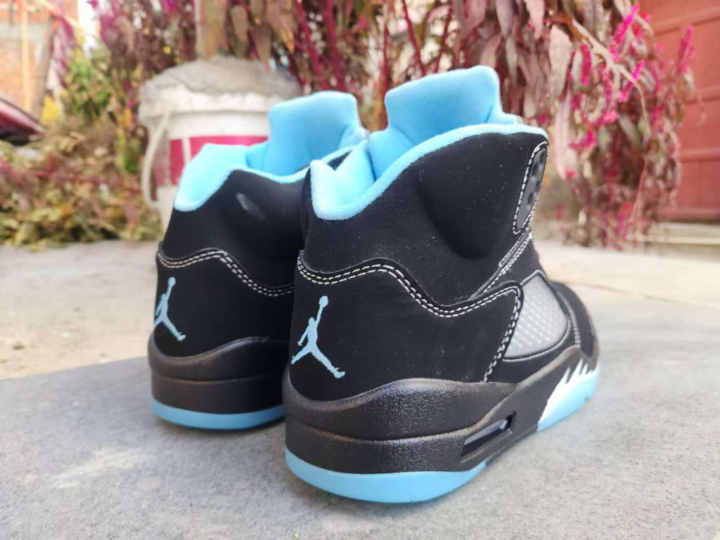 Air Jordan 5 Low in Black/University Blue - product image from the listing.