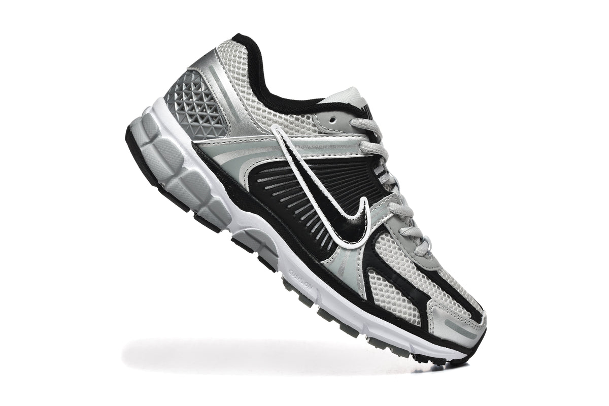 Nike Silver and Black Mesh Trainers - product image from the listing.