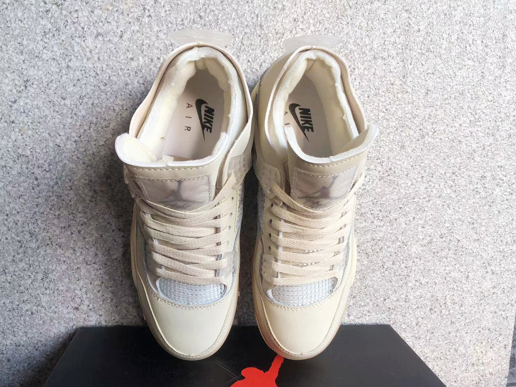 Jordan 4 Retro Sneakers in Off-White Sail - product image from the listing.