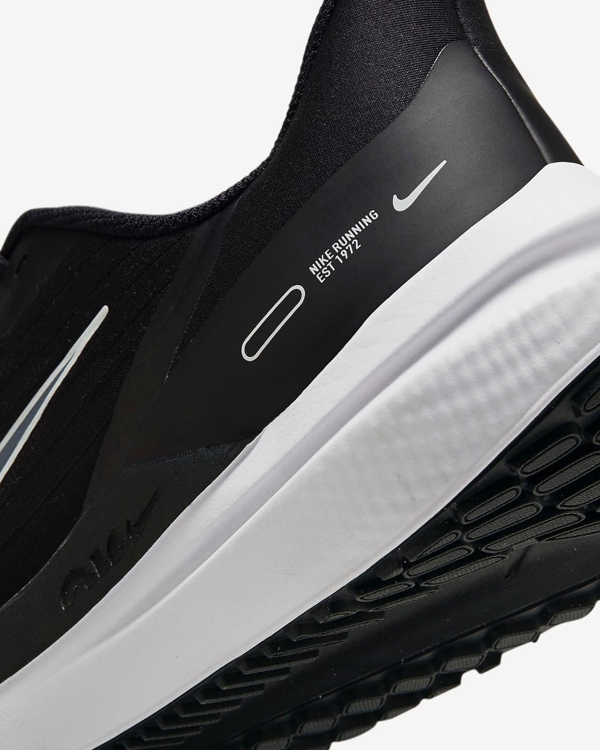 Nike Air Winflo 9 Running Shoes in Black DD6203-001 - product image from the listing.