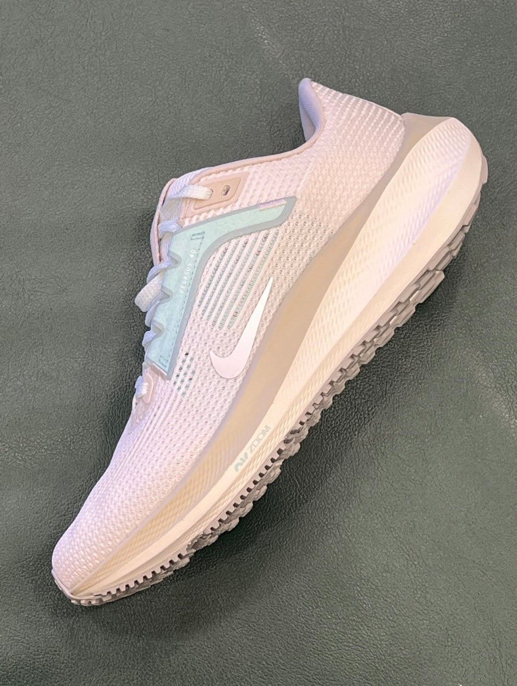 Nike Air Zoom Pegasus 40 Running Shoes FN7629-030 in Mint Green - product image from the listing.