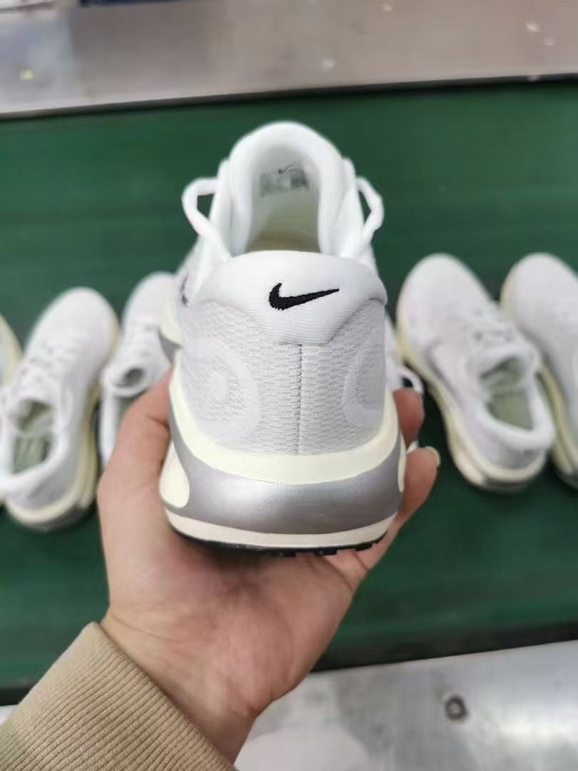 Nike Journey Run Road Shoes for Running White/Silver FJ7765-104 - product image from the listing.