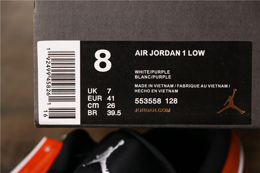 Air Jordan 1 Low Black White Orange Sneakers 553558-128 - product image from the listing.