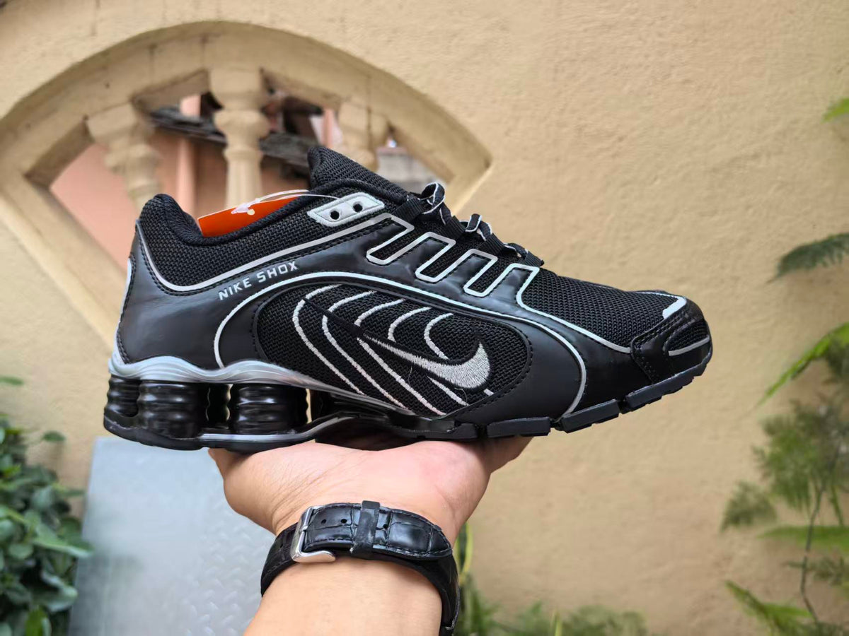 Nike Shox Sneakers in Black and Silver - product image from the listing.