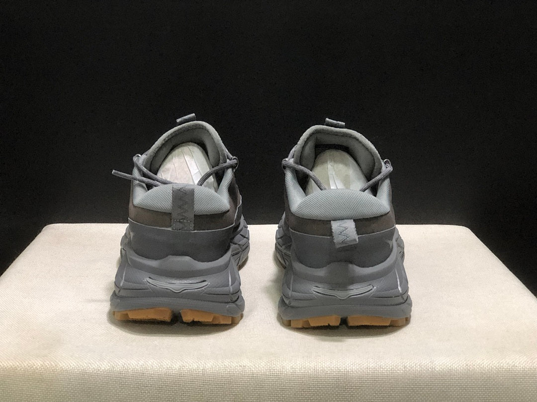 Gray HOKA Tor Summit Trail Sneakers - product image from the listing.