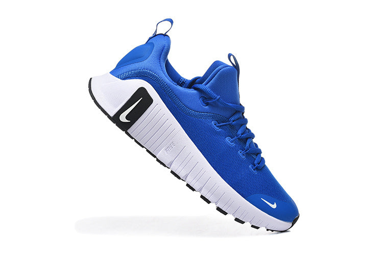 Nike Free Run Sneakers in Blue and White - product image from the listing.
