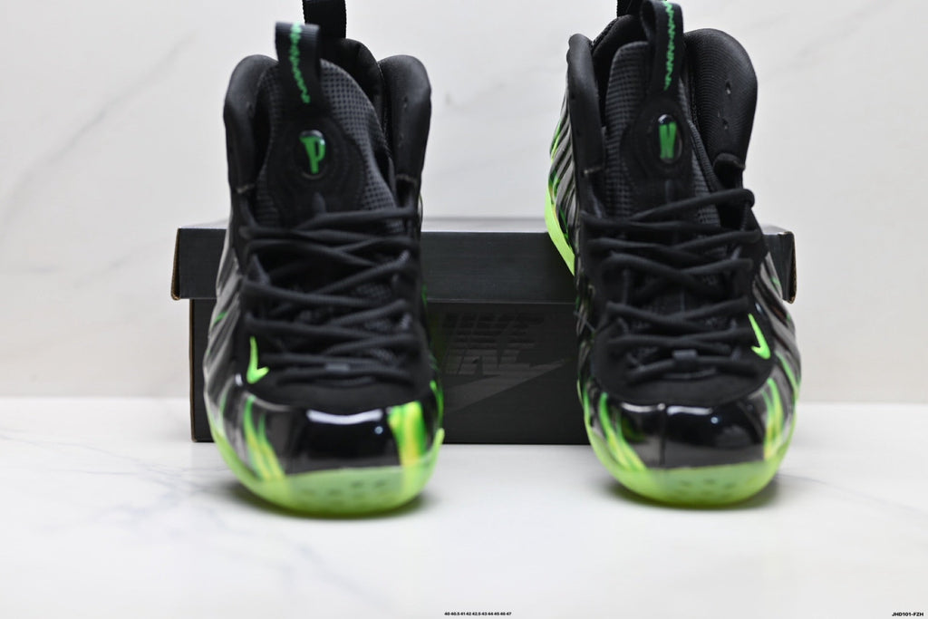 Nike Air Foamposite Huarache Basketball Sneakers in Black Green - product image from the listing.