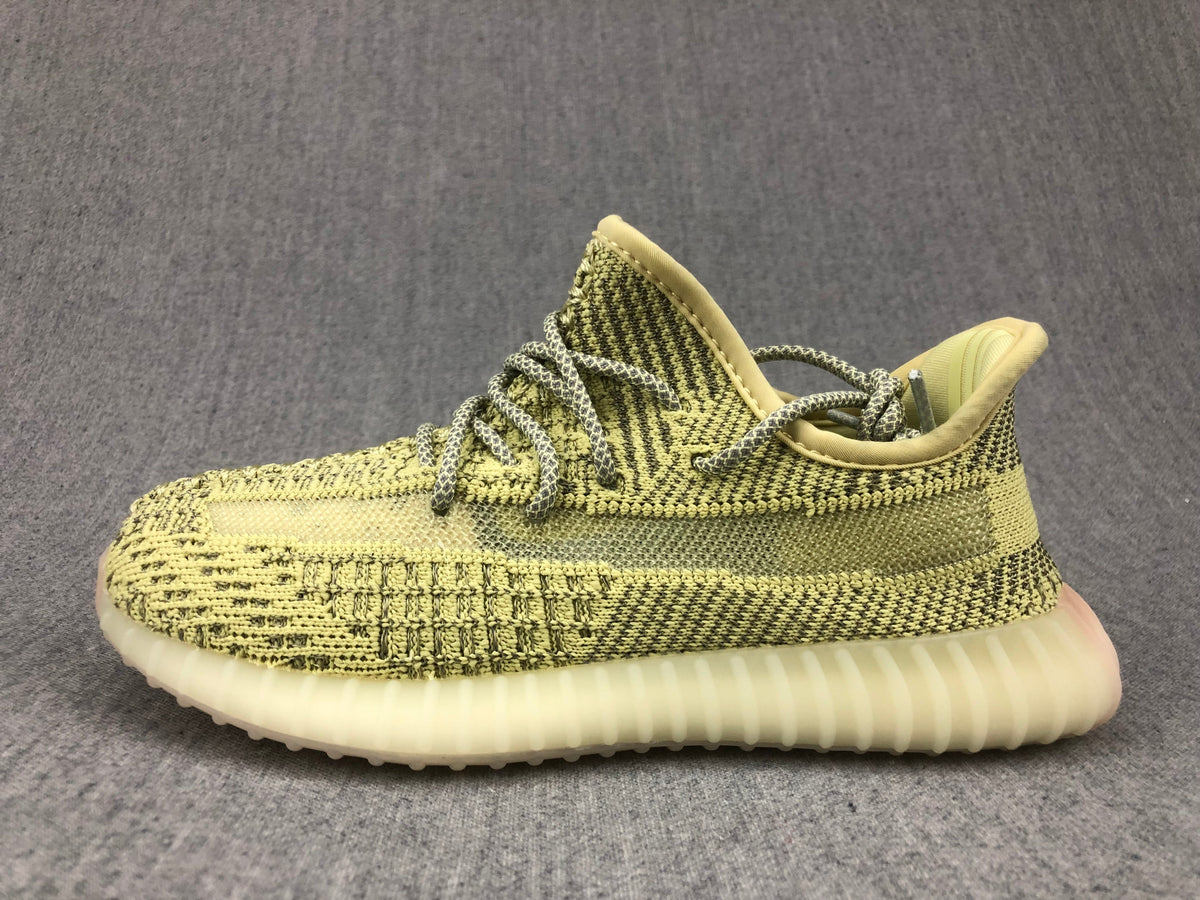 Yellow and Olive Yeezy 350 V2 Kids Sneakers - product image from the listing.