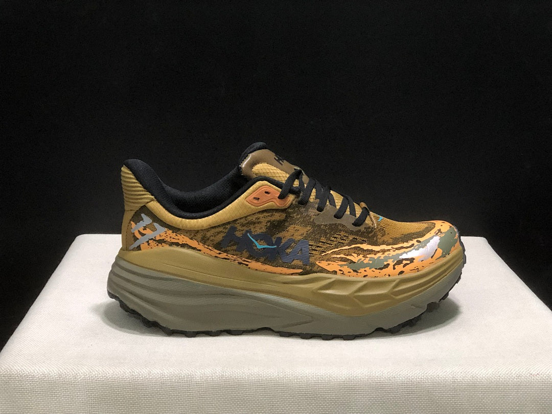 HOKA Stinson 7 Trail Shoes for Running in Camo - product image from the listing.
