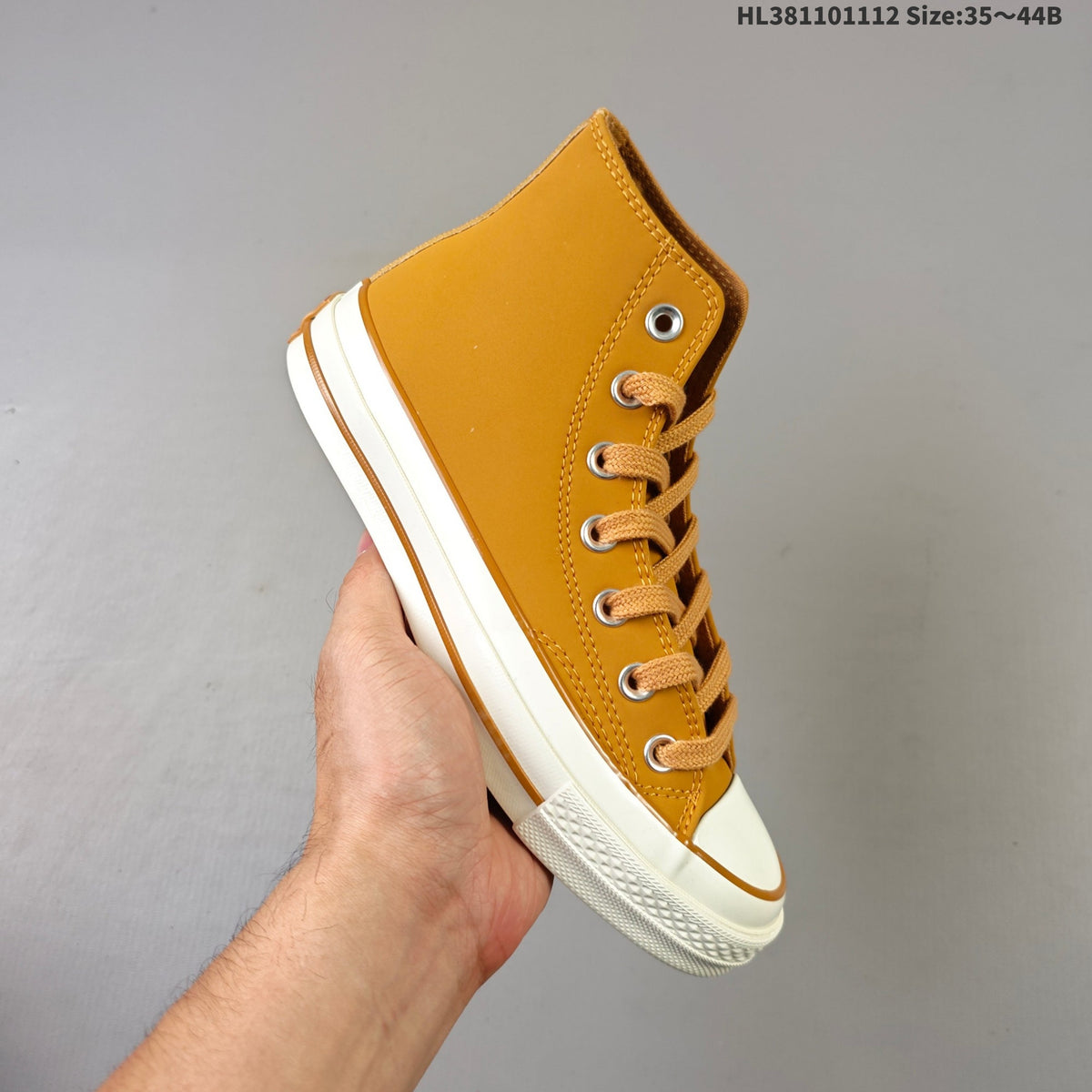 Converse Chuck 70 High Top Trainers in Mustard - product image from the listing.