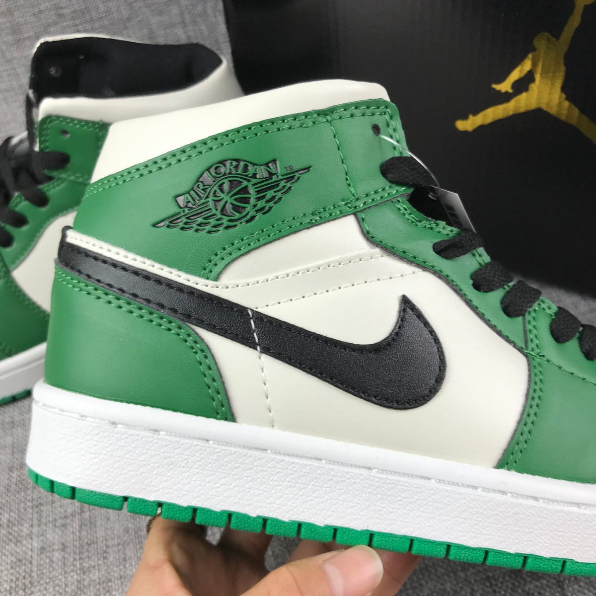 Air Jordan 1 Mid Celtics White Green Black Sneaker 852542-301 - product image from the listing.