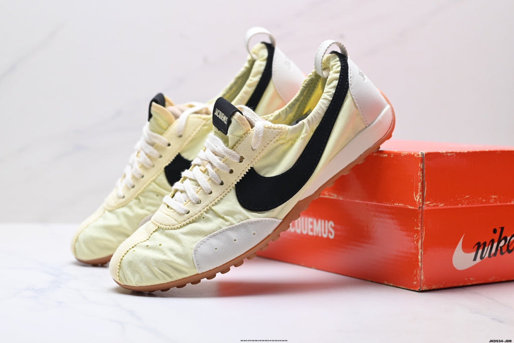 Pale Yellow and Black Nike x Jacquemus Sneakers - product image from the listing.