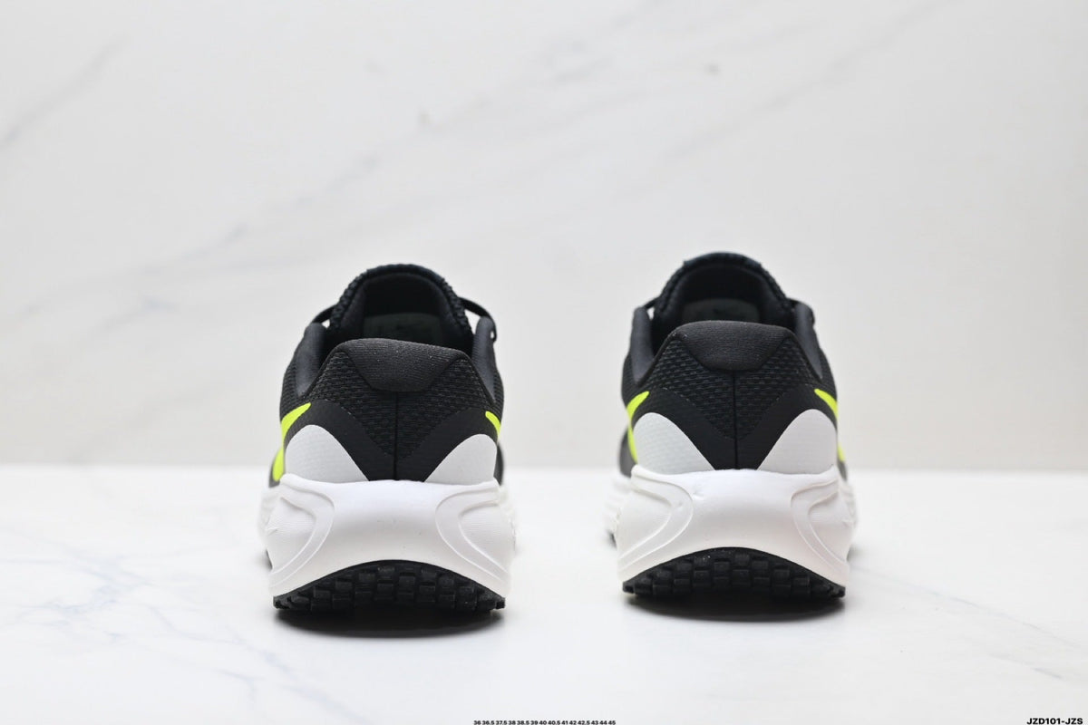 Nike Revolution 8 Running Shoes, in Black and Volt - product image from the listing.