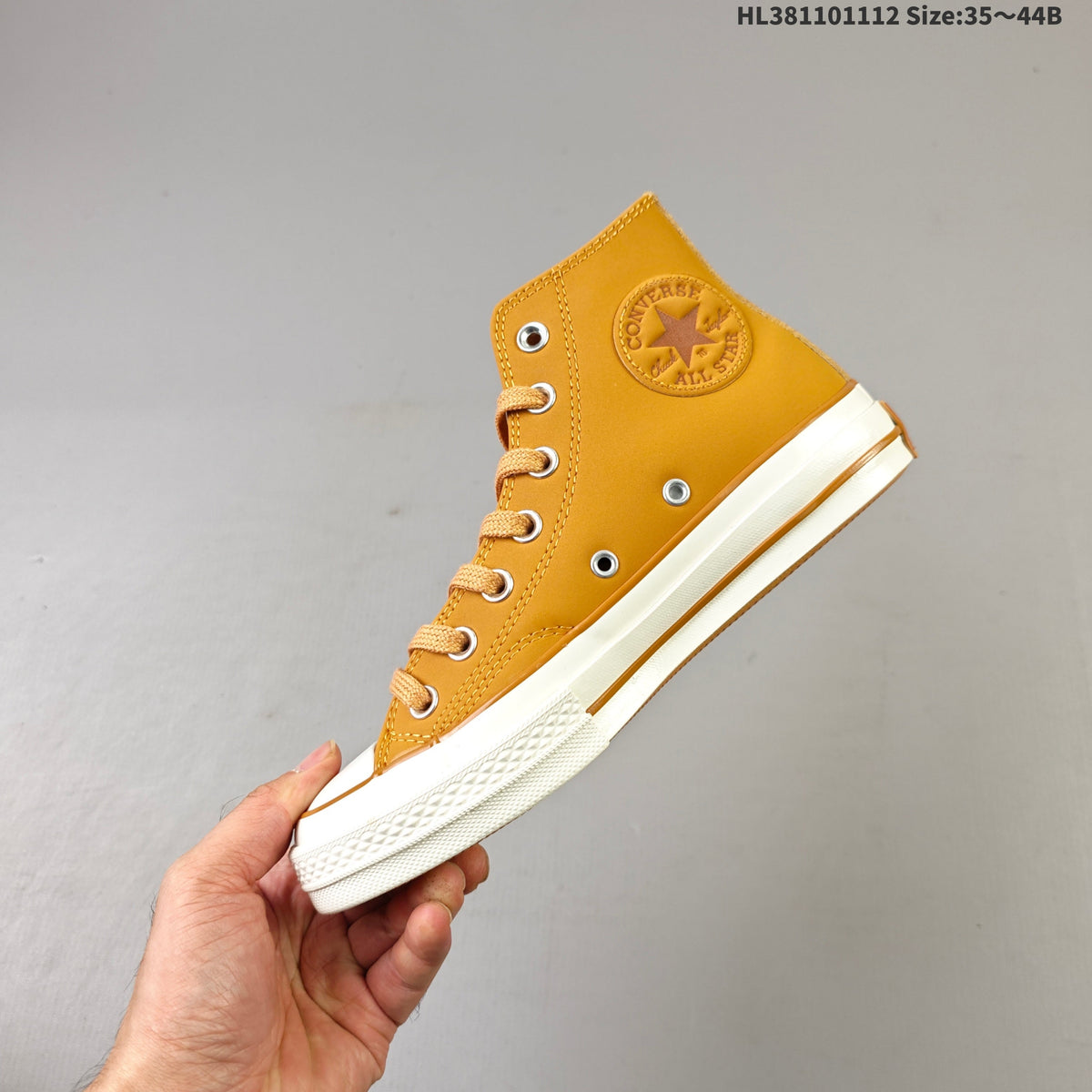 Converse Chuck 70 High Top Trainers in Mustard - product image from the listing.