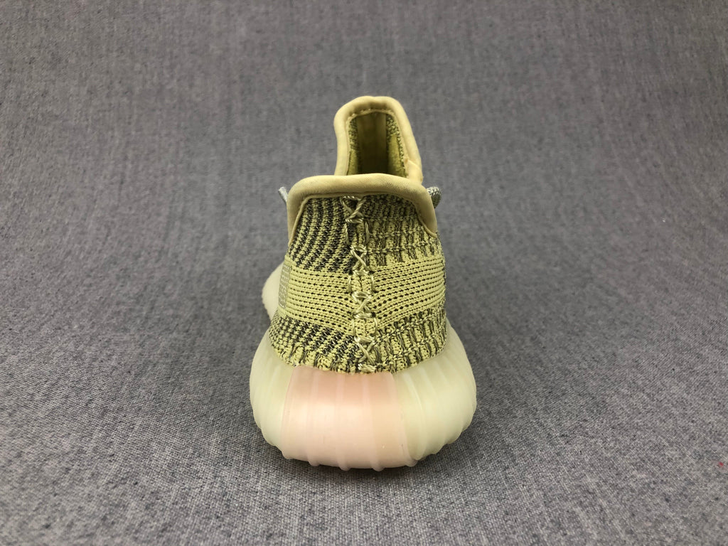 Yellow and Olive Yeezy 350 V2 Kids Sneakers - product image from the listing.