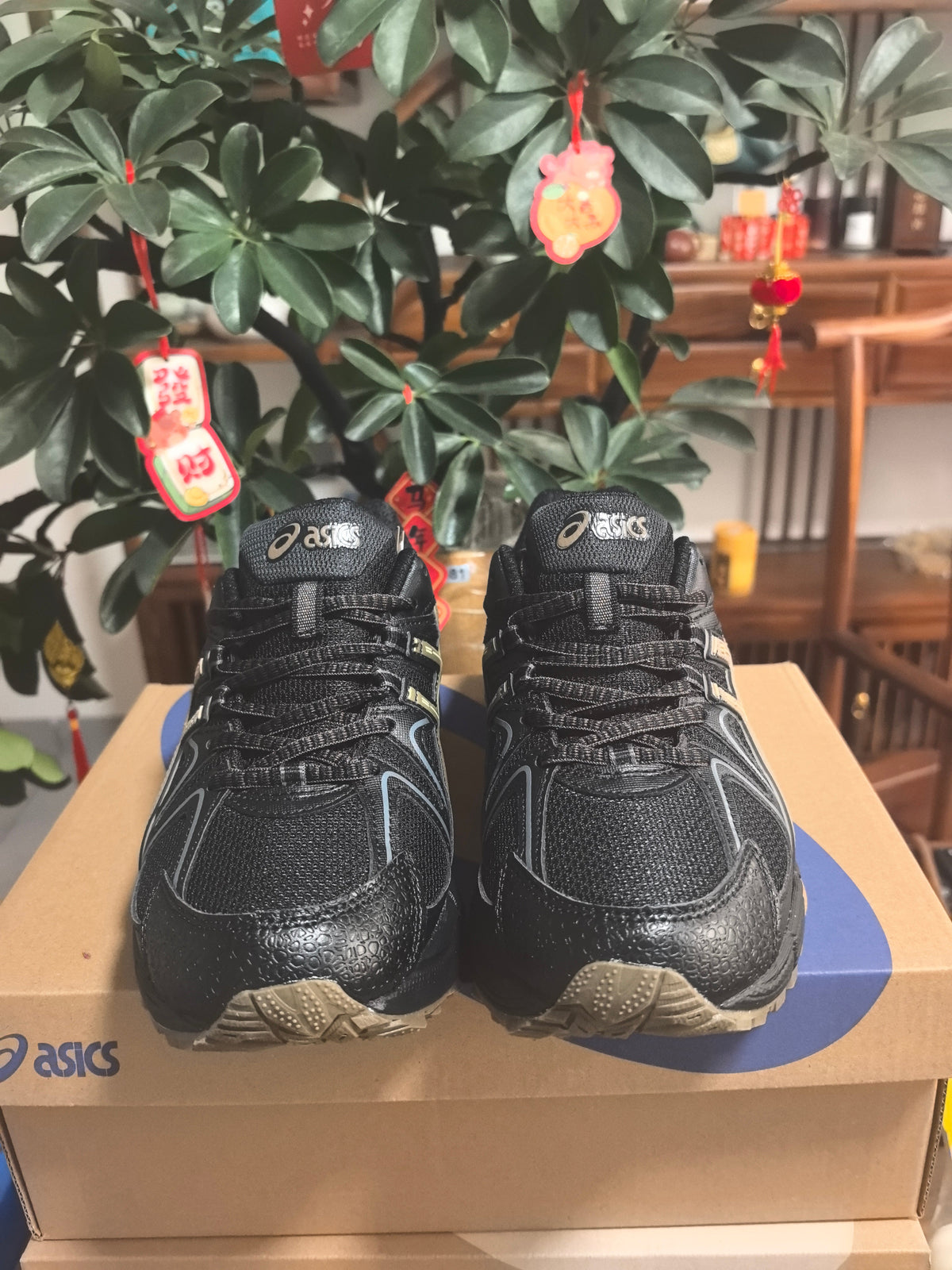 Black and Brown ASICS Gel-Kahana 8 Sneakers - product image from the listing.