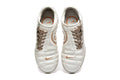 Nike Tiempo 90 Sneakers in White and Pale Yellow - product image from the listing.