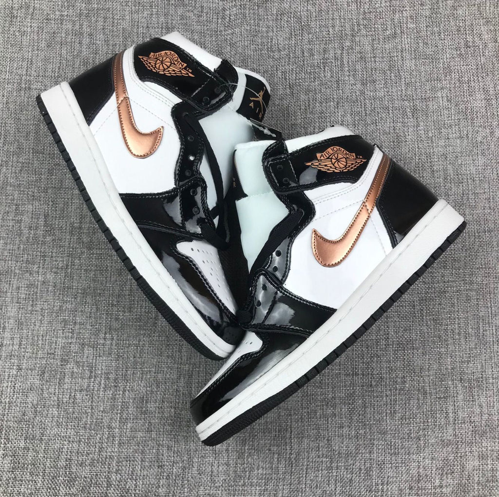 Air Jordan 1 Mid Sneakers in Black White Metallic Gold 852542-007 - product image from the listing.