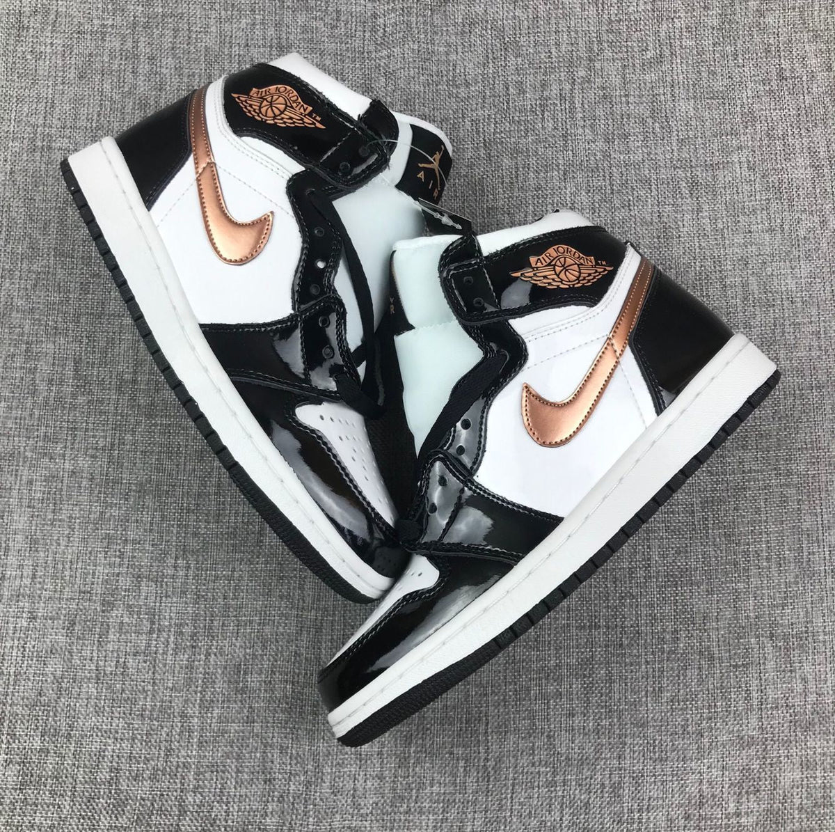 Air Jordan 1 Mid Sneakers in Black White Metallic Gold 852542-007 - product image from the listing.