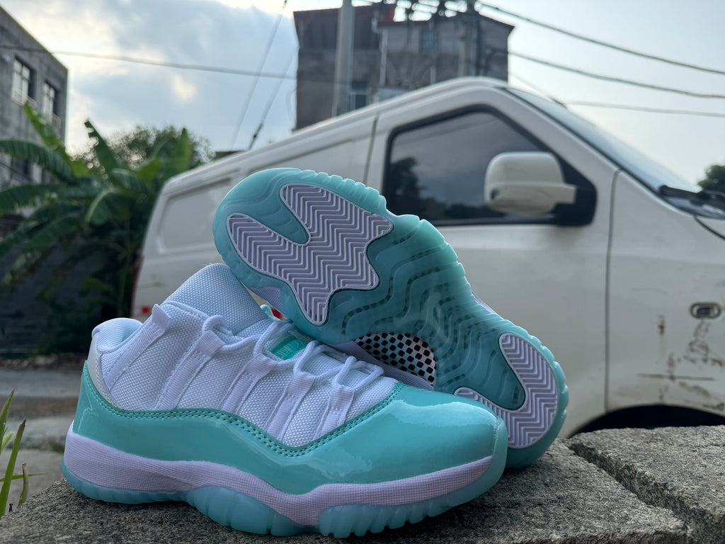 Air Jordan 11 Retro in White/Light Green - product image from the listing.