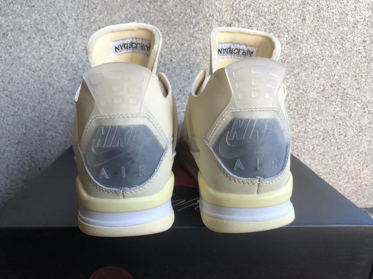 Jordan 4 Sneakers in Off-White Sail - product image from the listing.