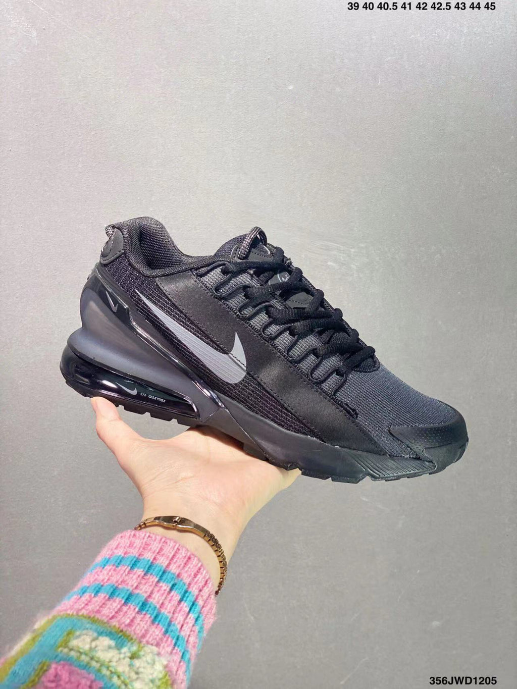 Black and Gray Nike Air Max Pulse Sneakers - product image from the listing.