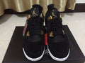 Jordan 4 High-Top Sneakers in Black and Gold - product image from the listing.