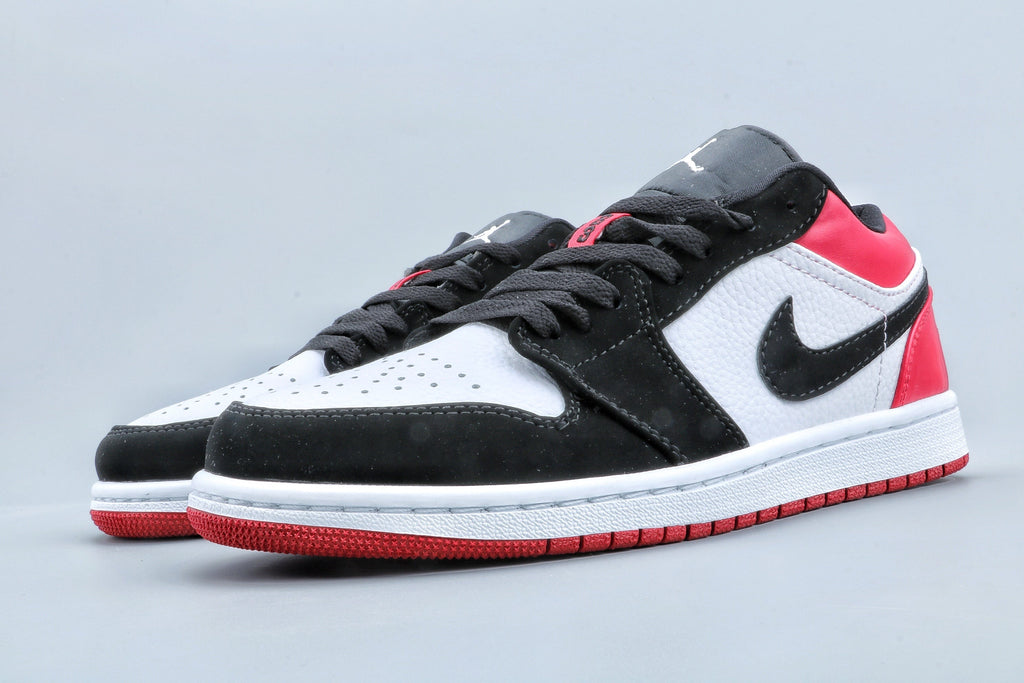 Jordan 1 Low Black Toe Sneakers in Black White Red - product image from the listing.
