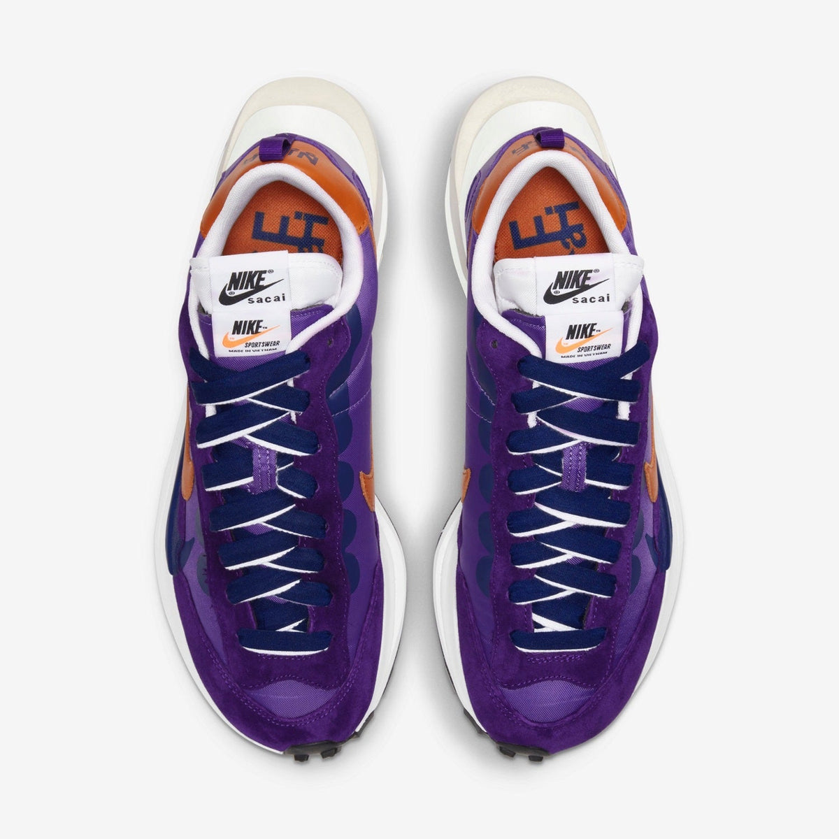 Nike x sacai VaporWaffle Sneakers in Purple DD1875-500 - product image from the listing.