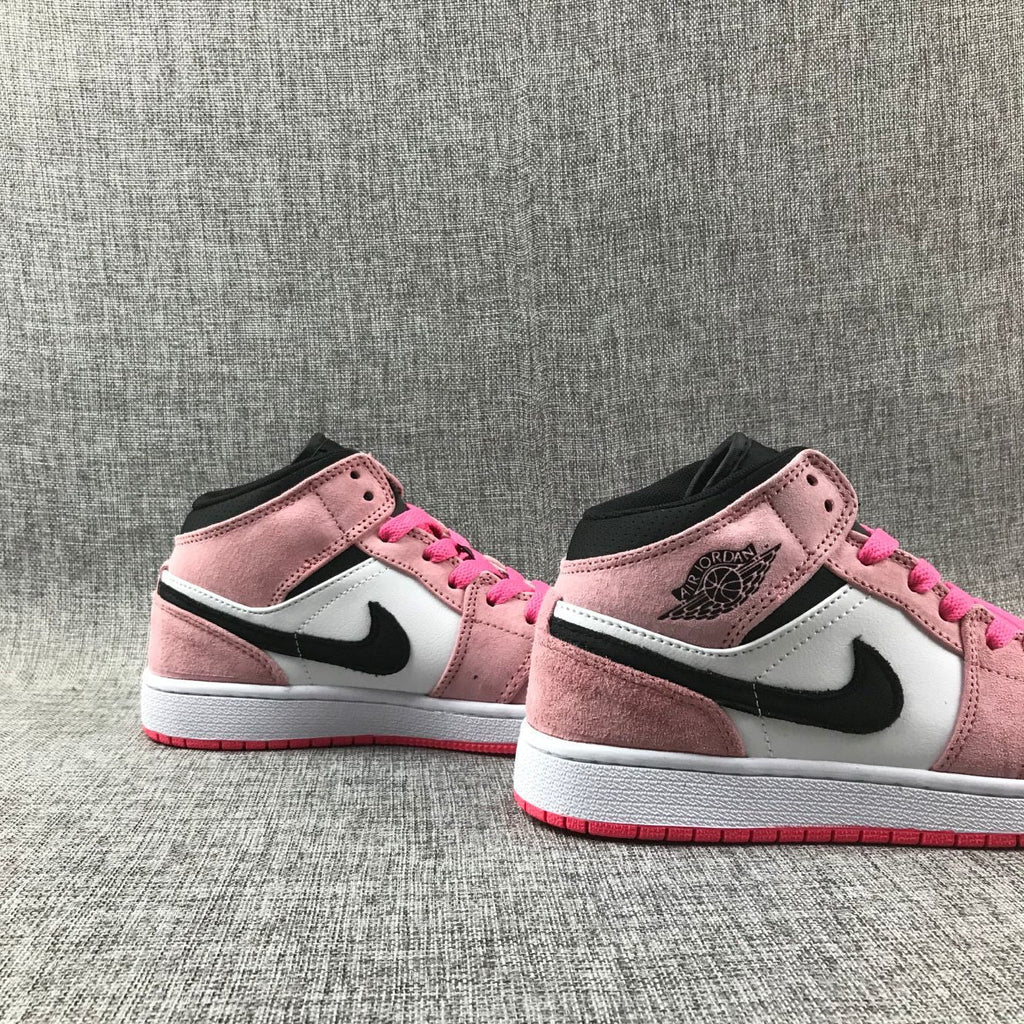 Air Jordan 1 Mid Sneakers in Pink 852542-801 - product image from the listing.