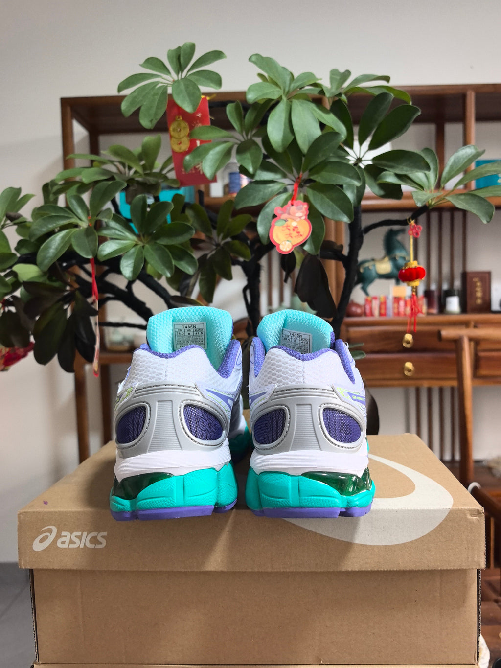 Blue and Purple ASICS GEL-NIMBUS 16 Sneakers - product image from the listing.