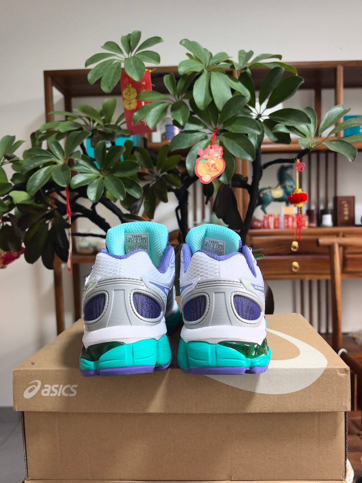 Blue and Purple ASICS GEL-NIMBUS 16 Sneakers - product image from the listing.