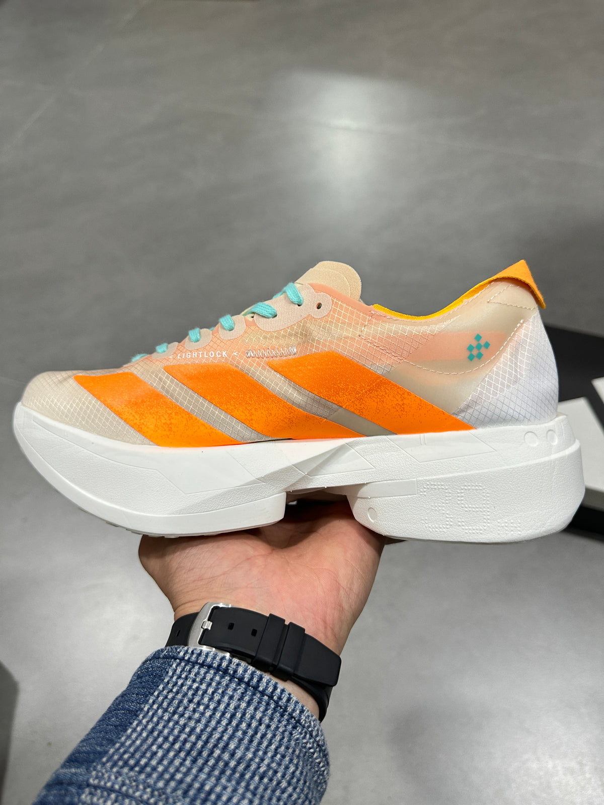 Nike Lightstrike Pro Running Shoes in White Orange Turquoise - product image from the listing.