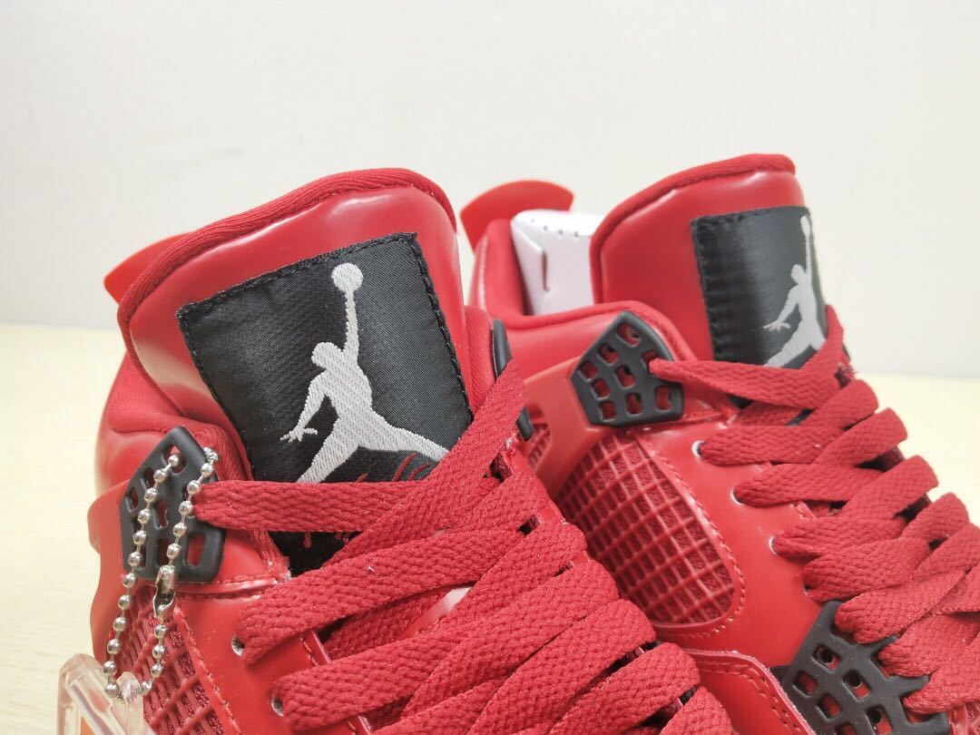 Air Jordan 4 Singles Day Sneakers in Red AV3914-600 - product image from the listing.