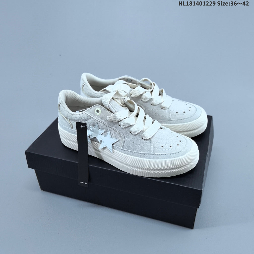 AMIRI Star Low-Cut Sneakers with Leopard Print Details - product image from the listing.