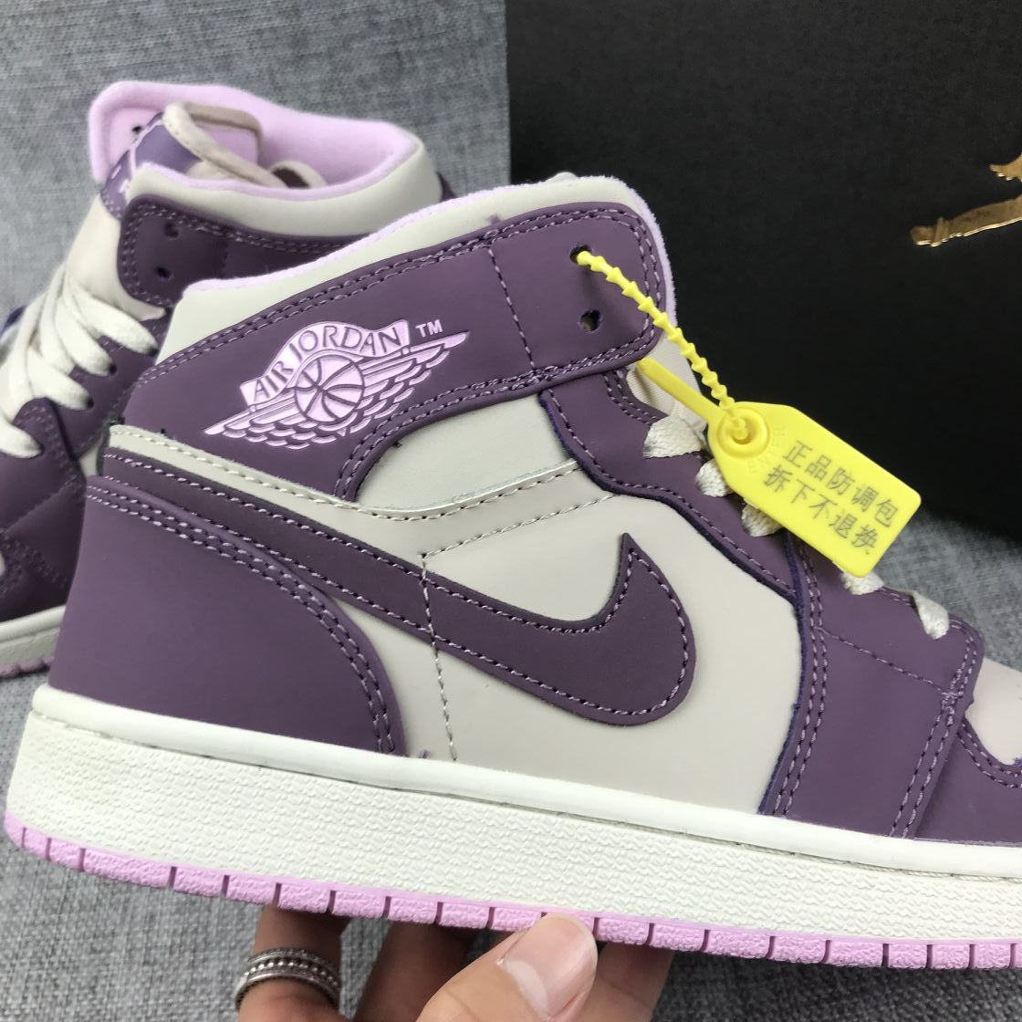 Air Jordan 1 Retro High OG Sneakers in White Purple - product image from the listing.