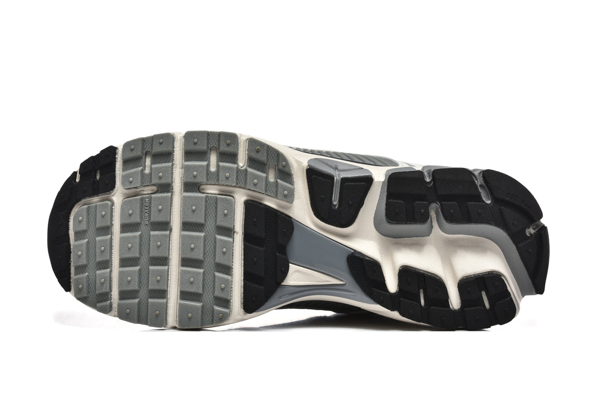 Grey and White Nike Zoom Vomero 5 Sneakers - product image from the listing.