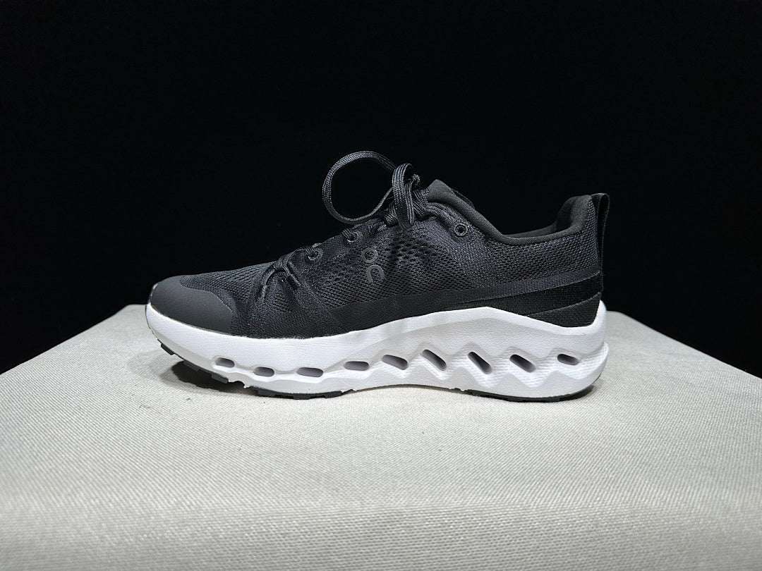 On Cloudsurfer Trail Trail Running Shoes in Black and White - product image from the listing.