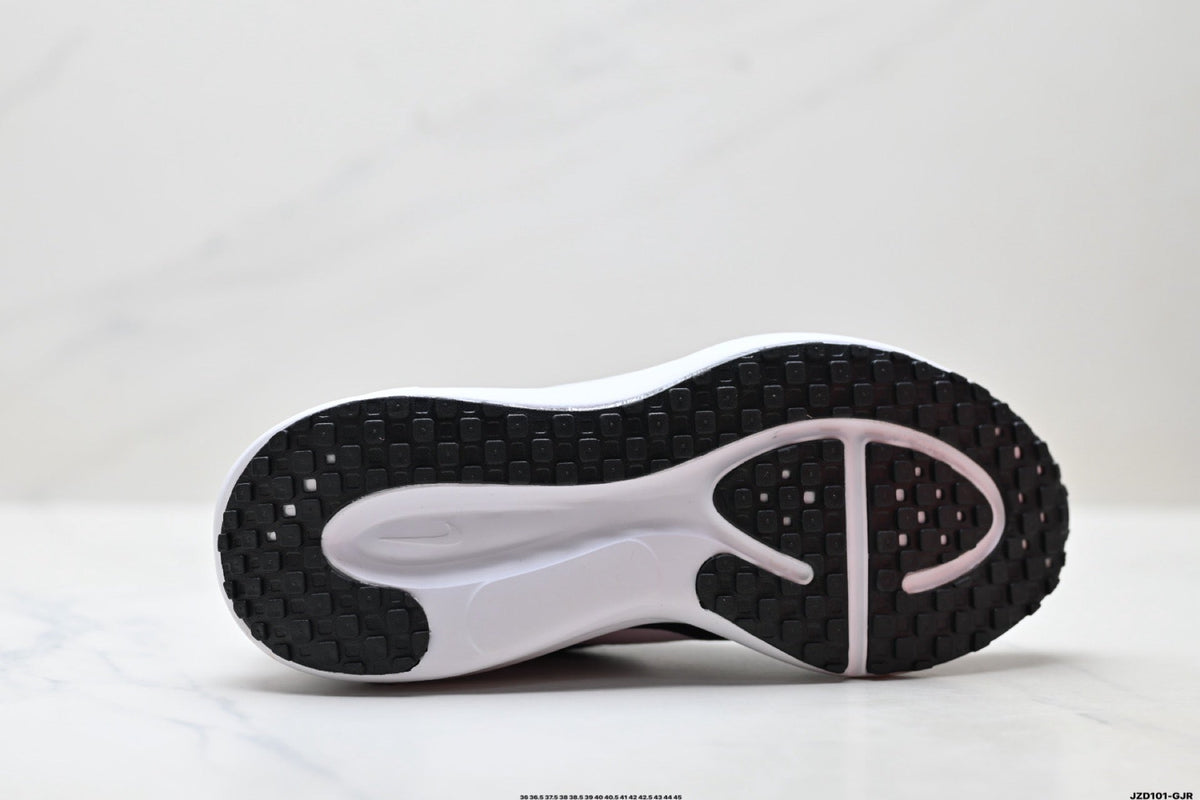 Nike Revolution 8 Running Shoes in Black and Pink - product image from the listing.