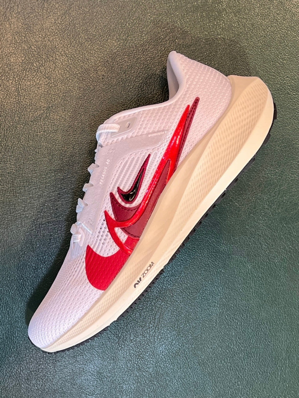 Nike Pegasus 40 PRM Running Shoes in White Red FB7703-100 - product image from the listing.