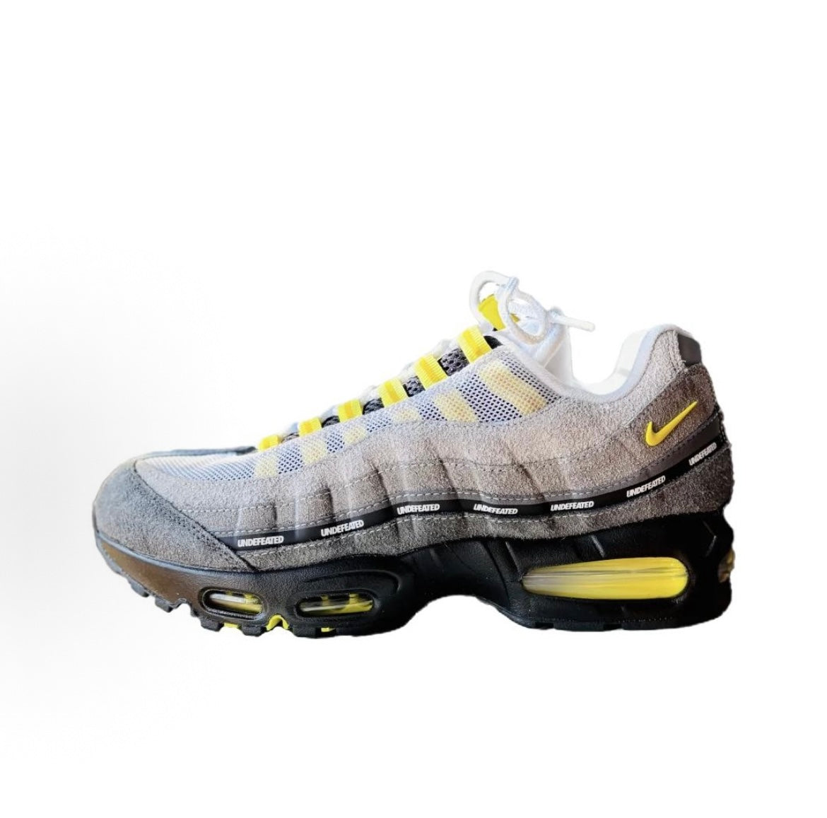Nike Air Max 95 SP x UNDEFEATED Sneakers in Grey Yellow IB4523-002 - product image from the listing.
