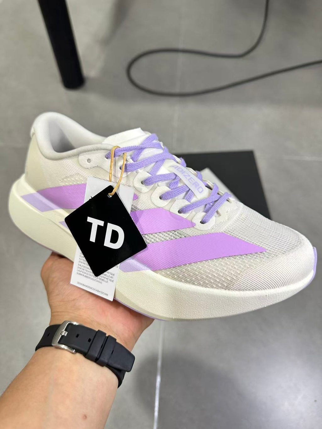 adidas Lightstrike Pro Running Shoes in White Purple KI7354 - product image from the listing.
