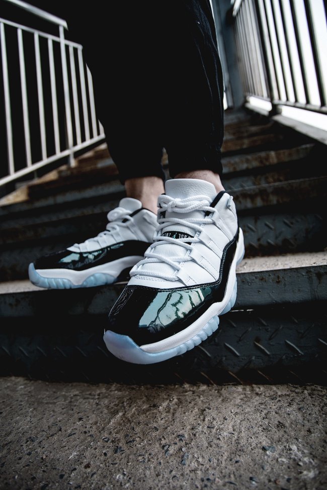 White and Black Air Jordan 11 Iridescent Sneakers - product image from the listing.