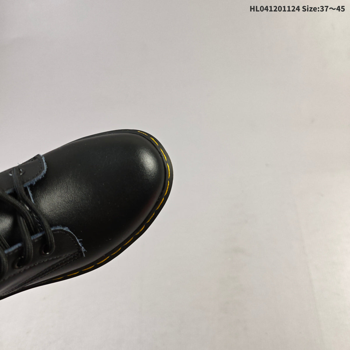 1460 Smooth Black Platform Lace-Up Boots by Dr. Martens - product image from the listing.