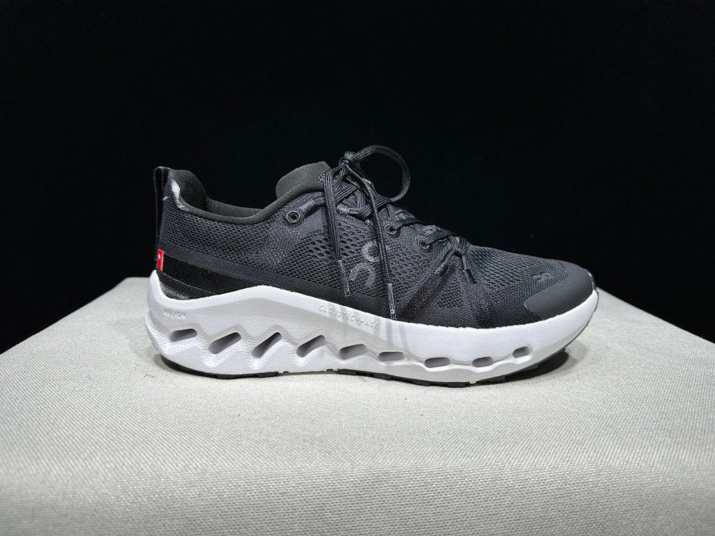 On Cloudsurfer Trail Trail Running Shoes in Black and White - product image from the listing.