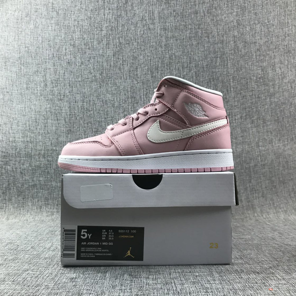 Women's Jordan 1 Mid Pink Sneakers 555112-100 - product image from the listing.