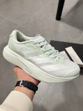 adidas Lightstrike Pro Running Shoes in White Green JR5840 - product image from the listing.