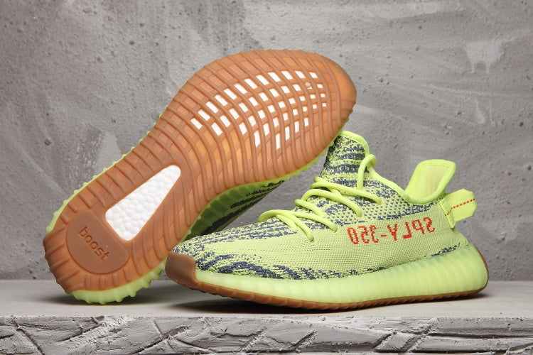 Lime Green and Brown Adidas Yeezy Boost 350 V2 Sneaker - product image from the listing.